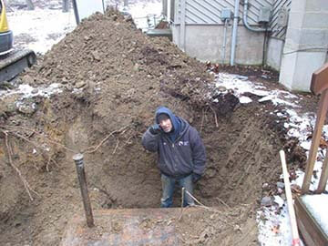 eddie digging out a tank in Milford PA