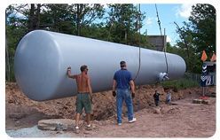 Buried 18,000 gal propane tank for 42 house development